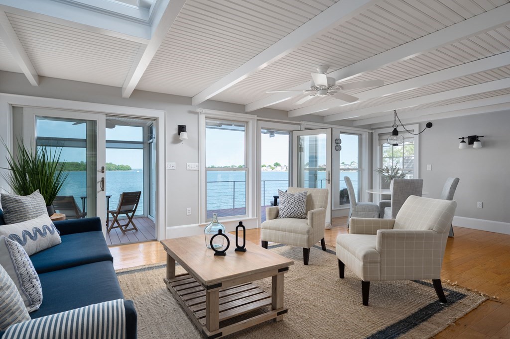 87 Bay Street Hull, MA 02045 - Photo 3 of 25 a living room with furniture and a large window