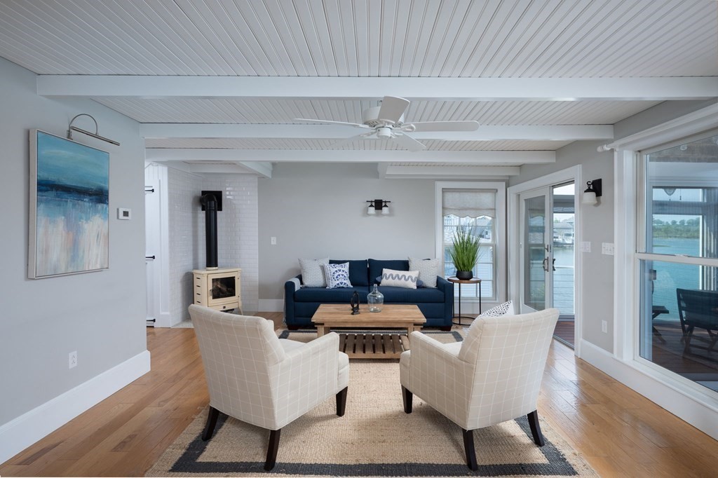87 Bay Street Hull, MA 02045 - Photo 5 of 25 a living room with furniture and a wooden floor