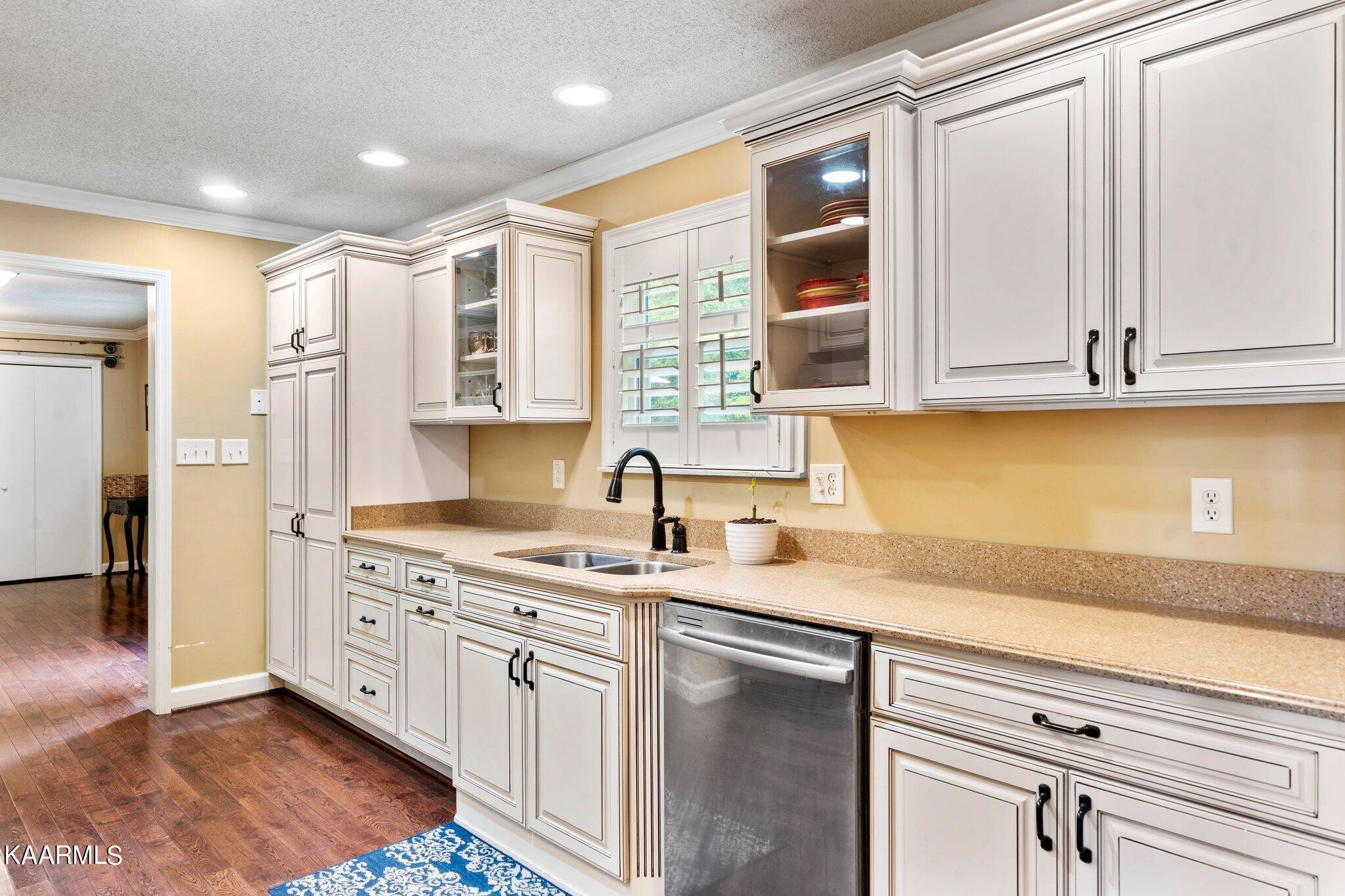 1309 Ridgeway Circle Athens, TN 37303 - Photo 9 of 48 a kitchen with stainless steel appliances granite countertop a sink stove and cabinets