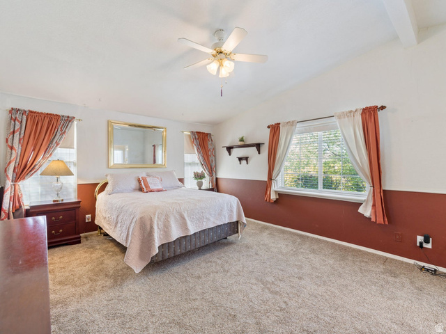 3941 West 40 North Hurricane, UT 84737 - Photo 21 of 55 Carpeted interior space featuring a vaulted ceiling and an overhead ceiling fan with lighting