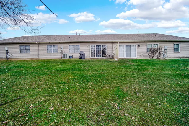 a view of a house with a garden