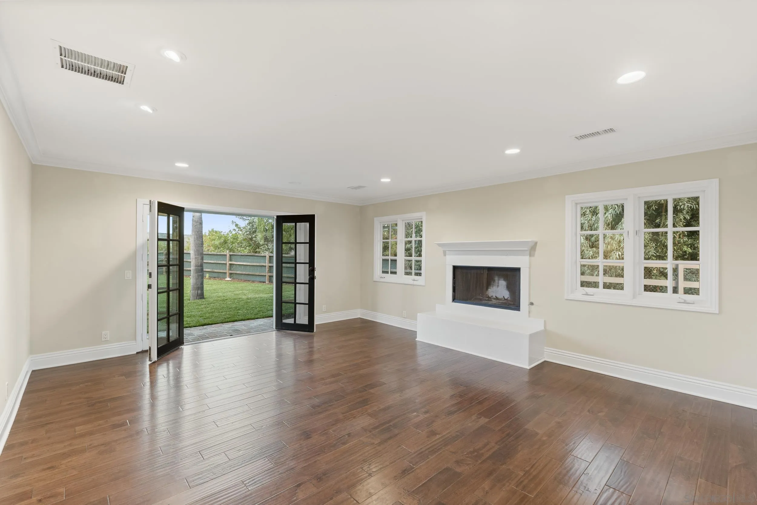 16551 Zumaque Street Rancho Santa Fe, CA 92067 - Photo 18 of 58 Fireplace, french doors, views