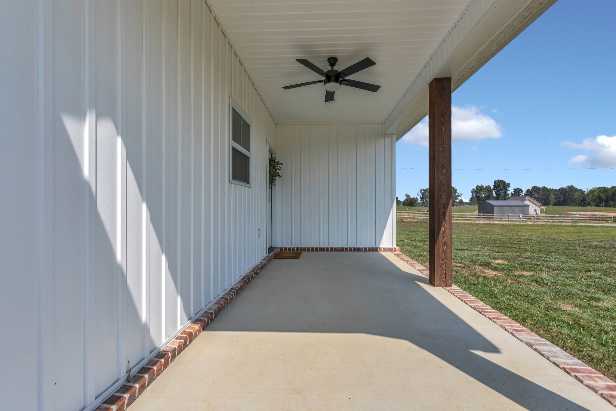 200 Beartown Road Loretto, TN 38469 - Photo 22 of 24 a view of a living room hardwood floor and ceiling window