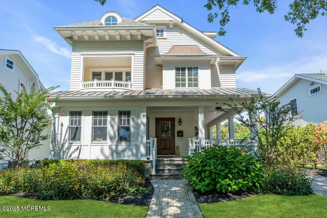 a view of a porch with furniture and a window