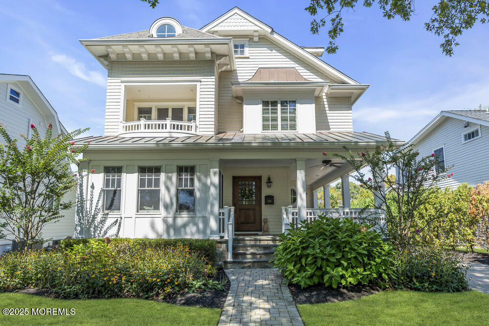 420 Tuttle Avenue Spring Lake, NJ 07762 - Photo 2 of 43 a front view of a house with garden