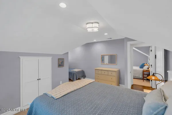 a view of a house with a yard porch and sitting area