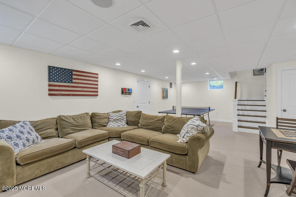 420 Tuttle Avenue Spring Lake, NJ 07762 - Photo 37 of 43 a living room with furniture and a couch