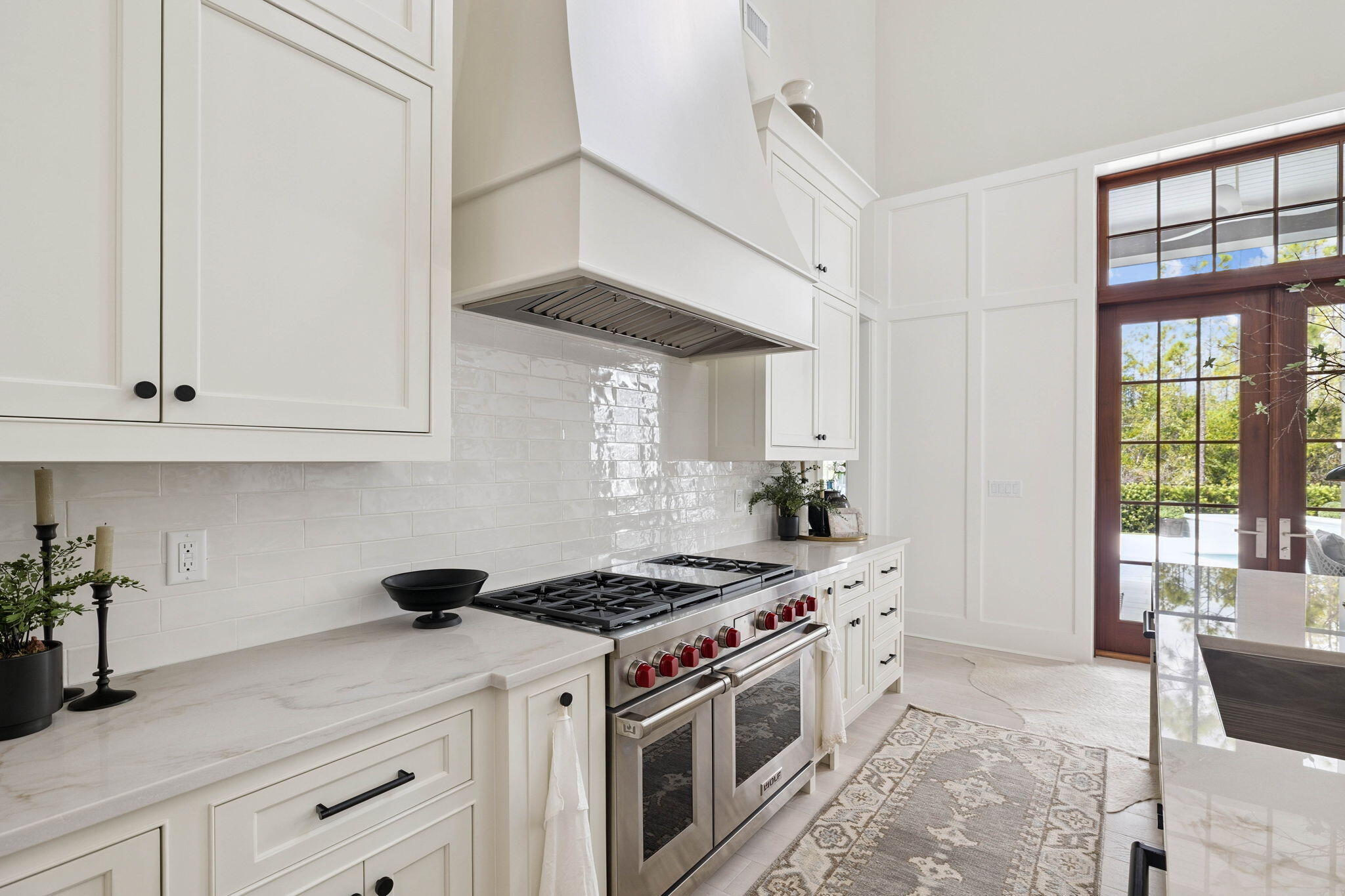 125 Golfridge Dr Inlet Beach Inlet Beach, FL 32461 - Photo 19 of 110 a kitchen with stainless steel appliances granite countertop a stove a sink and a white cabinets