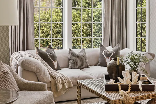 a kitchen with stainless steel appliances kitchen island granite countertop a sink and cabinets