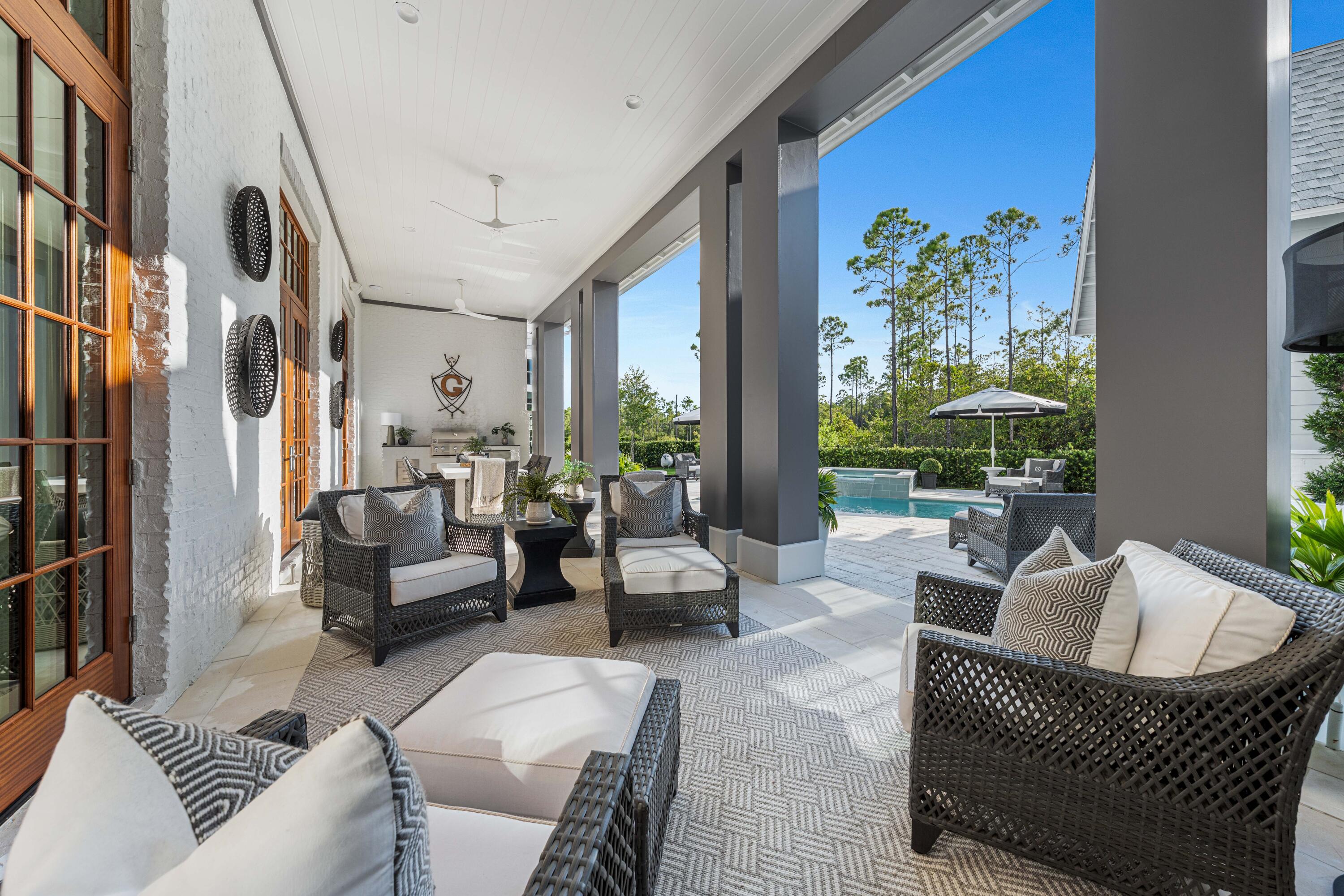 125 Golfridge Dr Inlet Beach Inlet Beach, FL 32461 - Photo 100 of 110 a living room with furniture fireplace and a large window