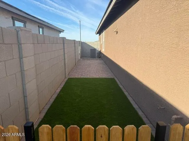 a front view of house with yard patio and green space