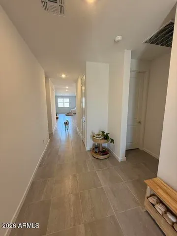a view of a backyard with table and chairs