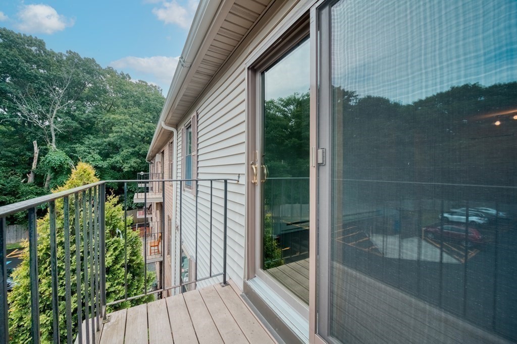 80 Stanton Street, Unit 32 Worcester, MA 01605 - Photo 15 of 21 a balcony with view of garden