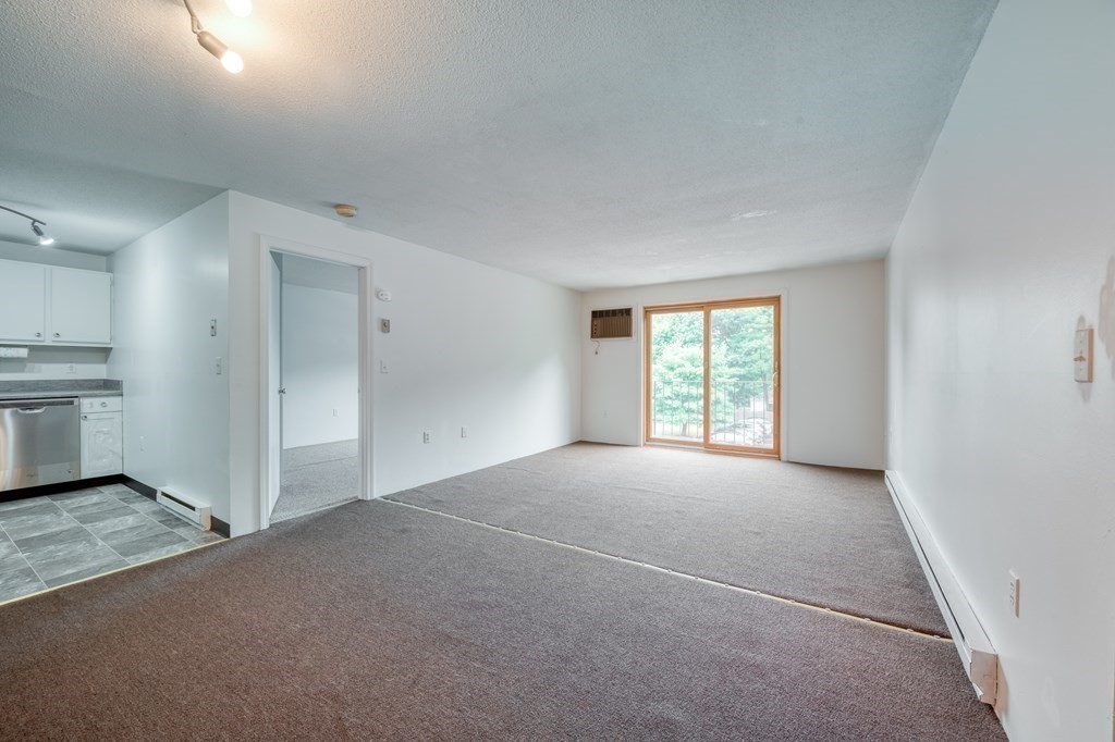 80 Stanton Street, Unit 32 Worcester, MA 01605 - Photo 3 of 21 a view of empty room with window
