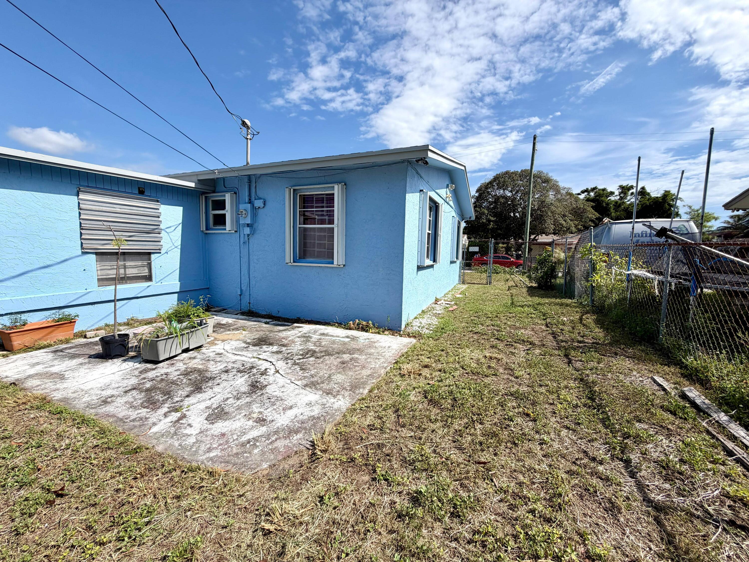 1117 West 23rd Street Riviera Beach, FL 33404 - Photo 4 of 15 house back 2