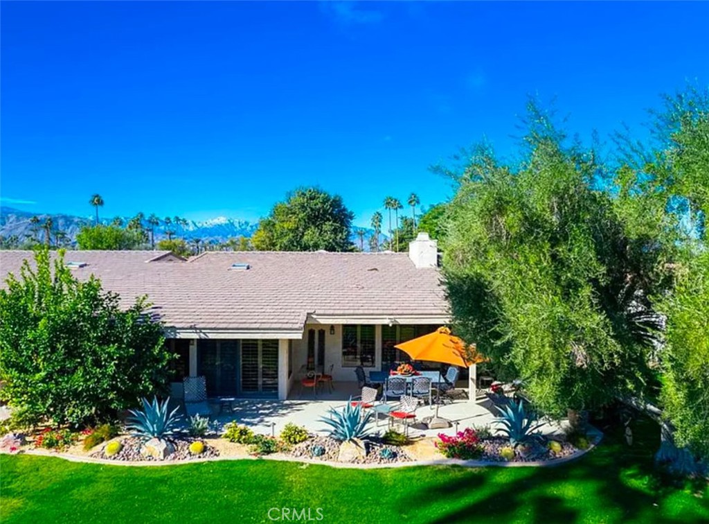 44824 Del Dios Circle Indian Wells, CA 92210 - Photo 1 of 7 a view of swimming pool and outdoor seating