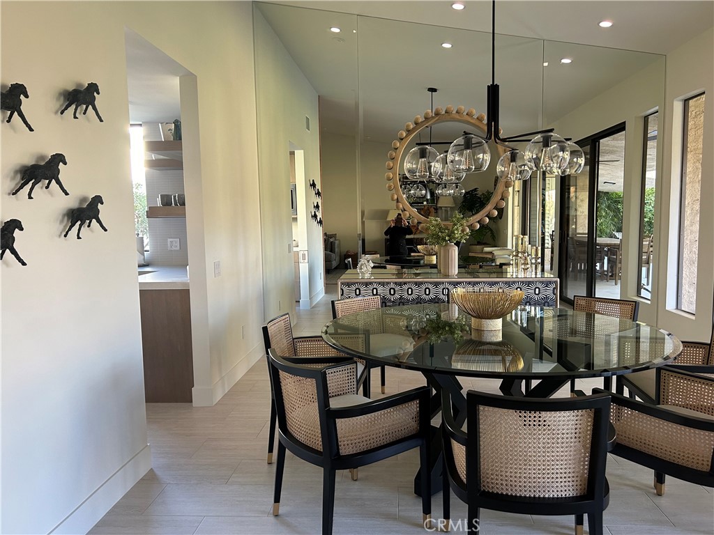 44824 Del Dios Circle Indian Wells, CA 92210 - Photo 5 of 7 a view of a dining room with furniture and a chandelier