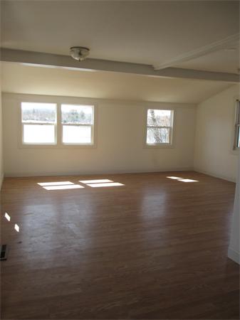 47 Pequot Point Road Westfield, MA 01085 - Photo 4 of 8 an empty room with windows