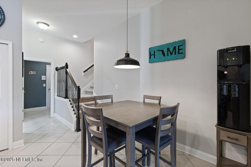 10944 Lothmore Road Jacksonville, FL 32221 - Photo 28 of 85 a view of a dining room with furniture