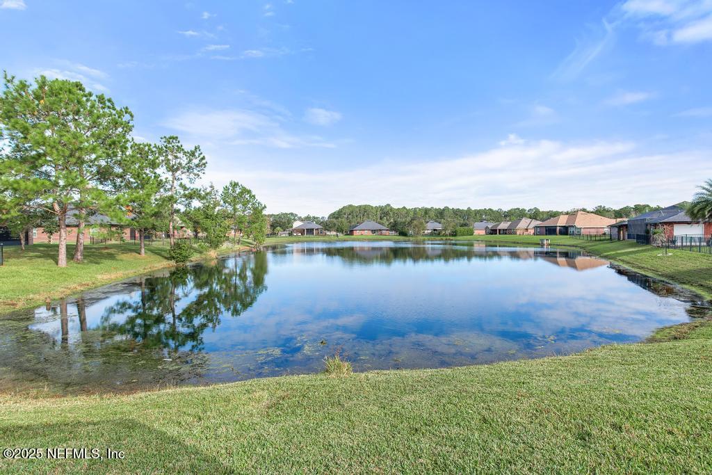10944 Lothmore Road Jacksonville, FL 32221 - Photo 69 of 85 a view of a lake with houses in the back