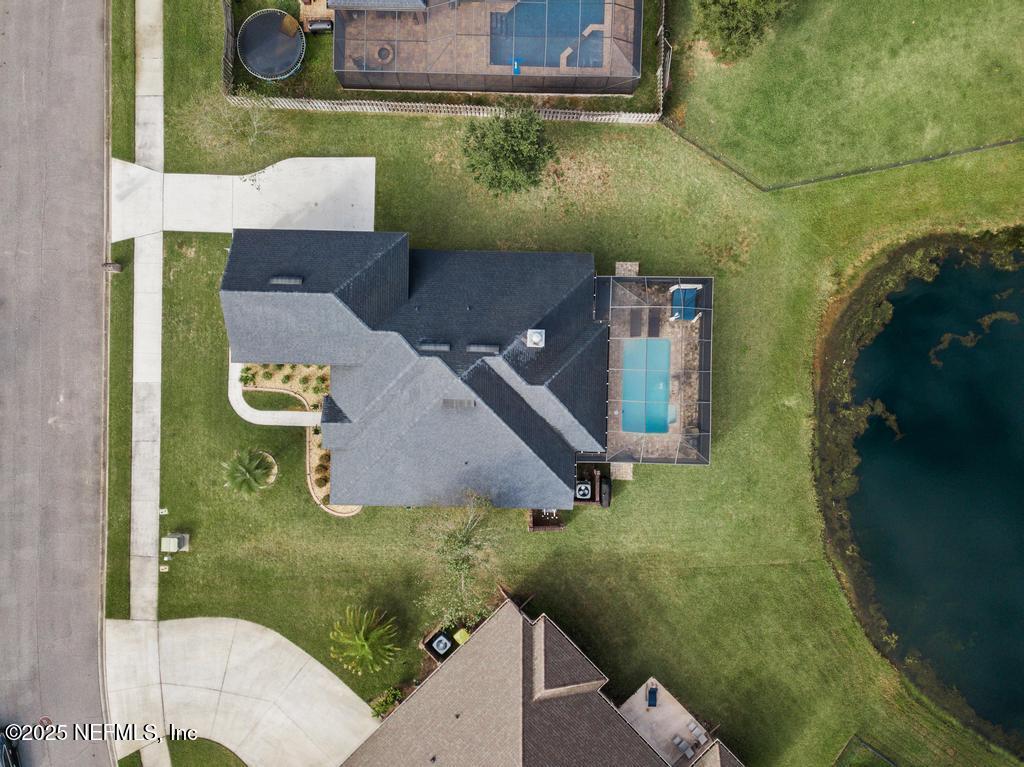 10944 Lothmore Road Jacksonville, FL 32221 - Photo 71 of 85 an aerial view of a house with a yard