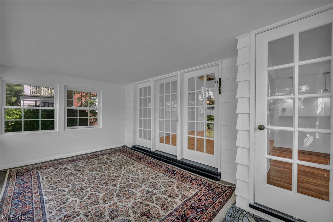 3543 Lytle Road Shaker Heights, OH 44122 - Photo 40 of 49 Enclosed porch featuring multiple large windows and glass-paneled doors