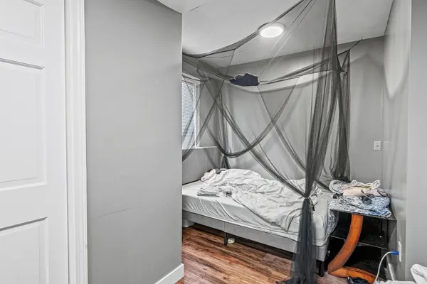 a view of a room with table and chairs