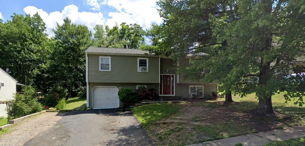 62 Springbrook Road Nanuet, NY 10954 - Photo 1 of 1 Bi-level home with a garage