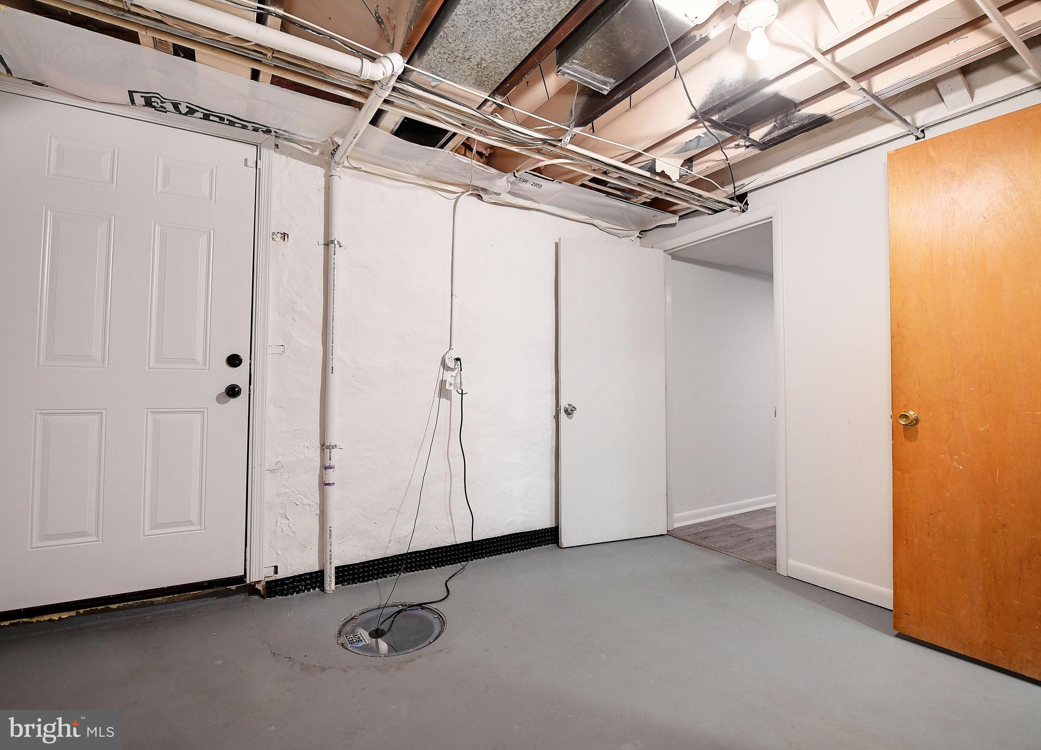 5511 Greenleaf Road Baltimore, MD 21210 - Photo 44 of 45 Basement w/ Sump Pump