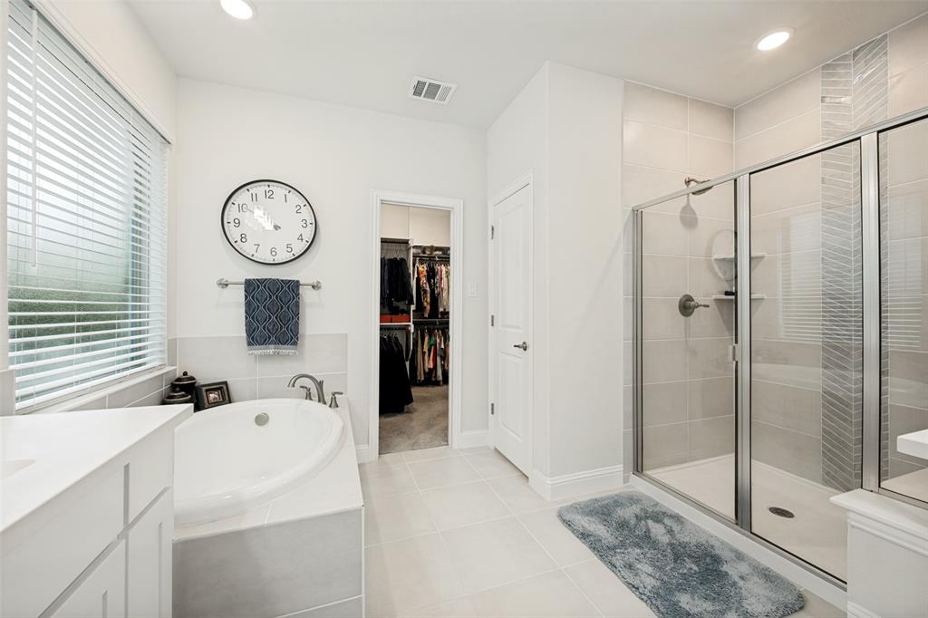 2508 Henley Way Mansfield, TX 76084 - Photo 24 of 25 a bathroom with a shower a sink and a mirror