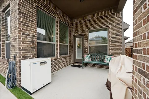 a view of outdoor space and barbecue grill