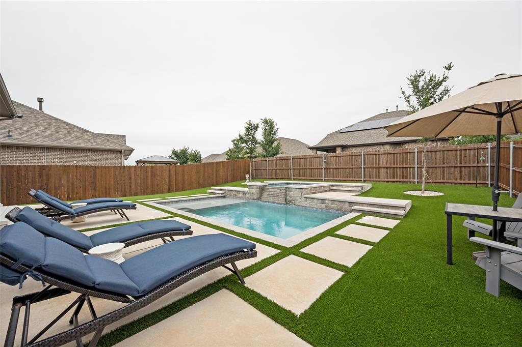 2508 Henley Way Mansfield, TX 76084 - Photo 4 of 25 an outdoor sitting area with swimming pool