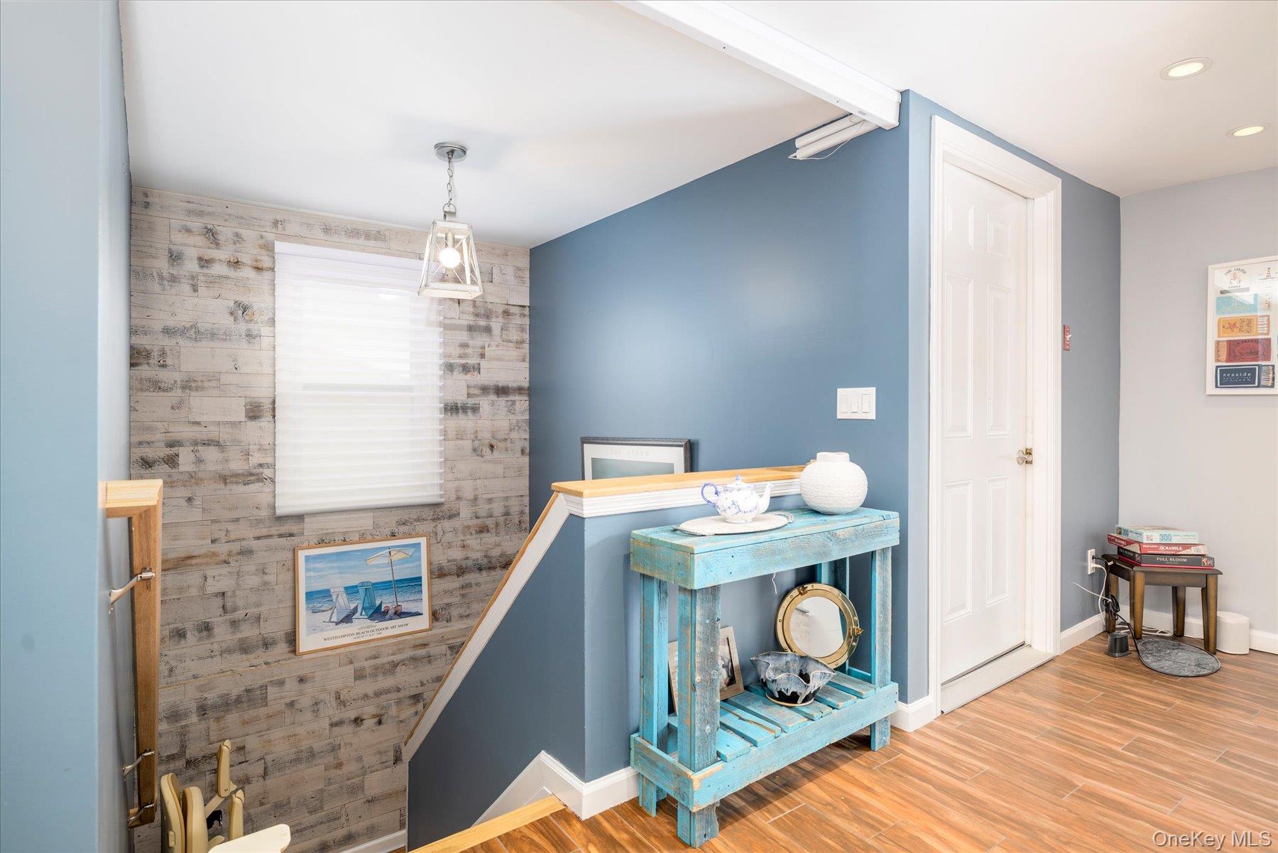 35 Nebraska Street Long Beach, NY 11561 - Photo 12 of 24 Stairwell to First Floor with Shiplap Accent Wall