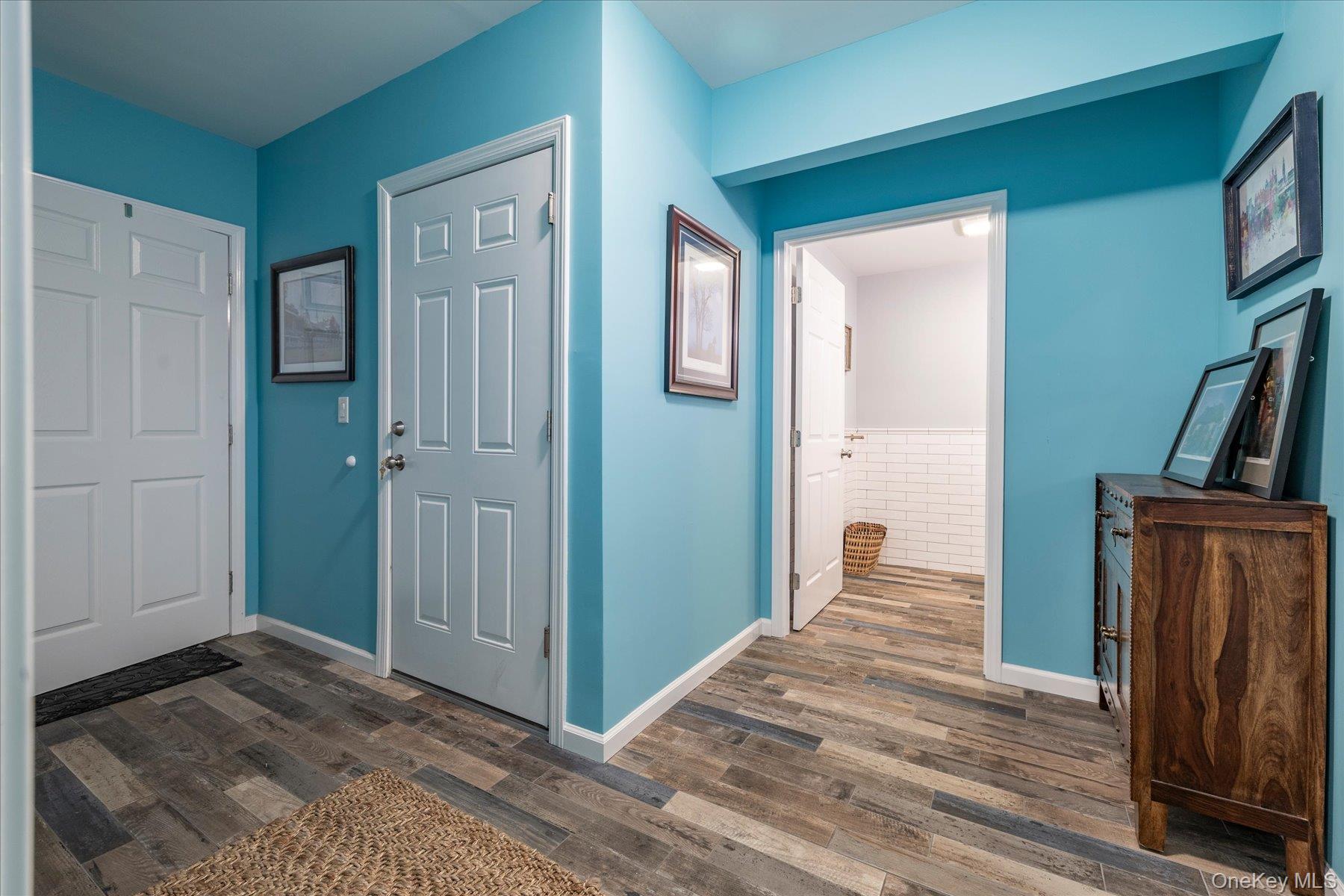 35 Nebraska Street Long Beach, NY 11561 - Photo 15 of 24 First Floor Hallway to Office, Half Bath, Back Door to Outdoor Shower