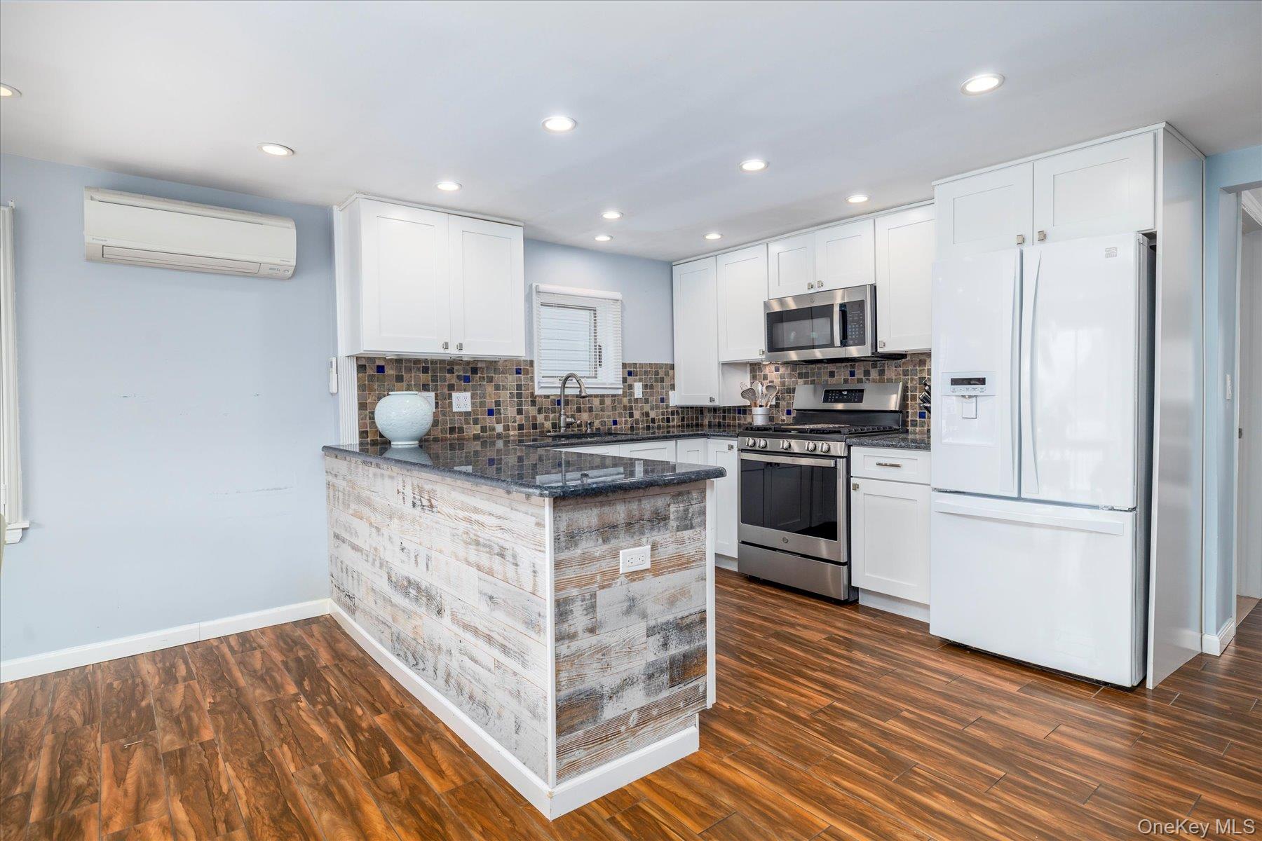 35 Nebraska Street Long Beach, NY 11561 - Photo 6 of 24 Spacious Open Kitchen with Shiplap Accents