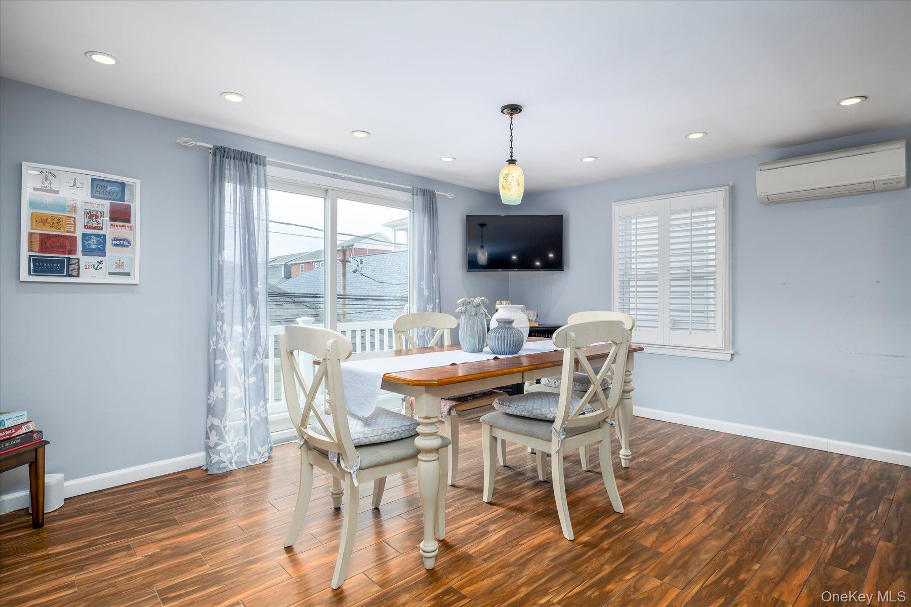 35 Nebraska Street Long Beach, NY 11561 - Photo 7 of 24 Open Kitchen to Dining Area and Sliders to Back Deck