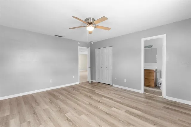 an aerial view of a house with a swimming pool outdoor seating and yard