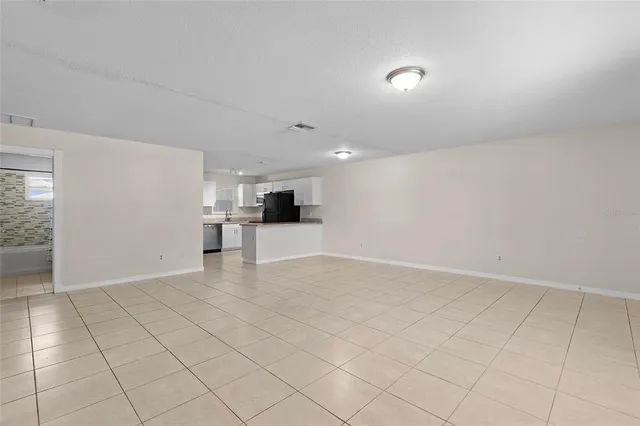 a view of an empty room and window