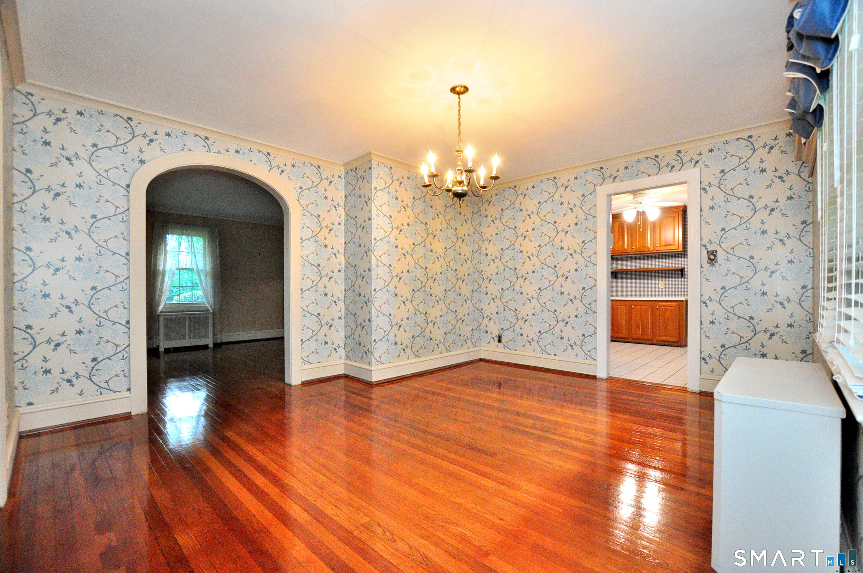 10 Harvey Road Windsor, CT 06095 - Photo 8 of 36 a view of livingroom with hardwood floor and hallway