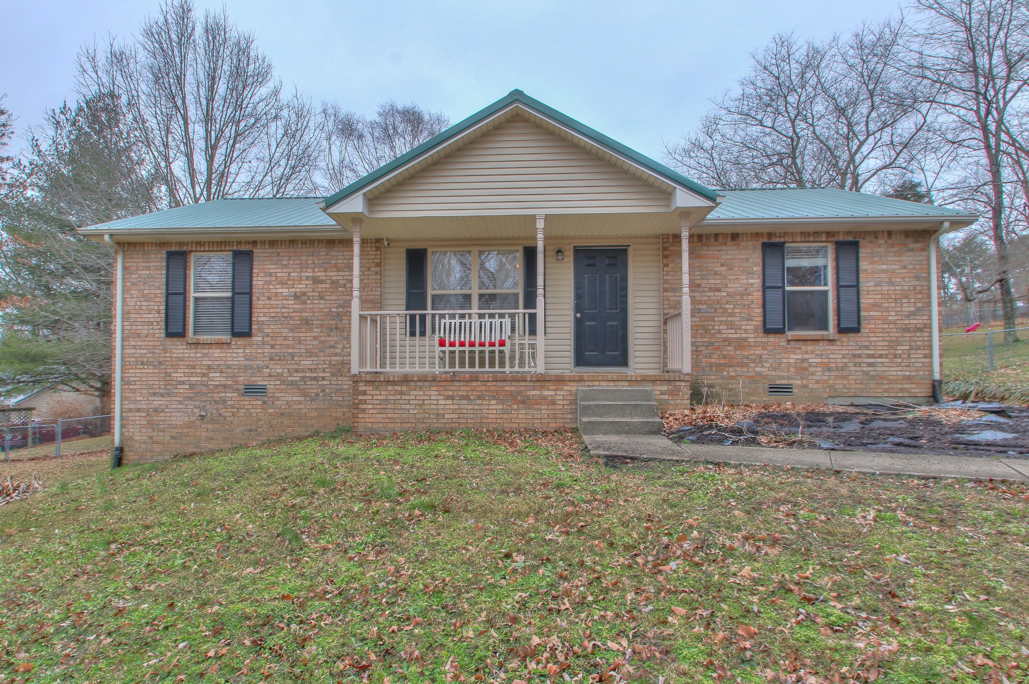1006 Richland Trail Road Ashland City, TN 37015 - Photo 1 of 33 a front view of a house with garden