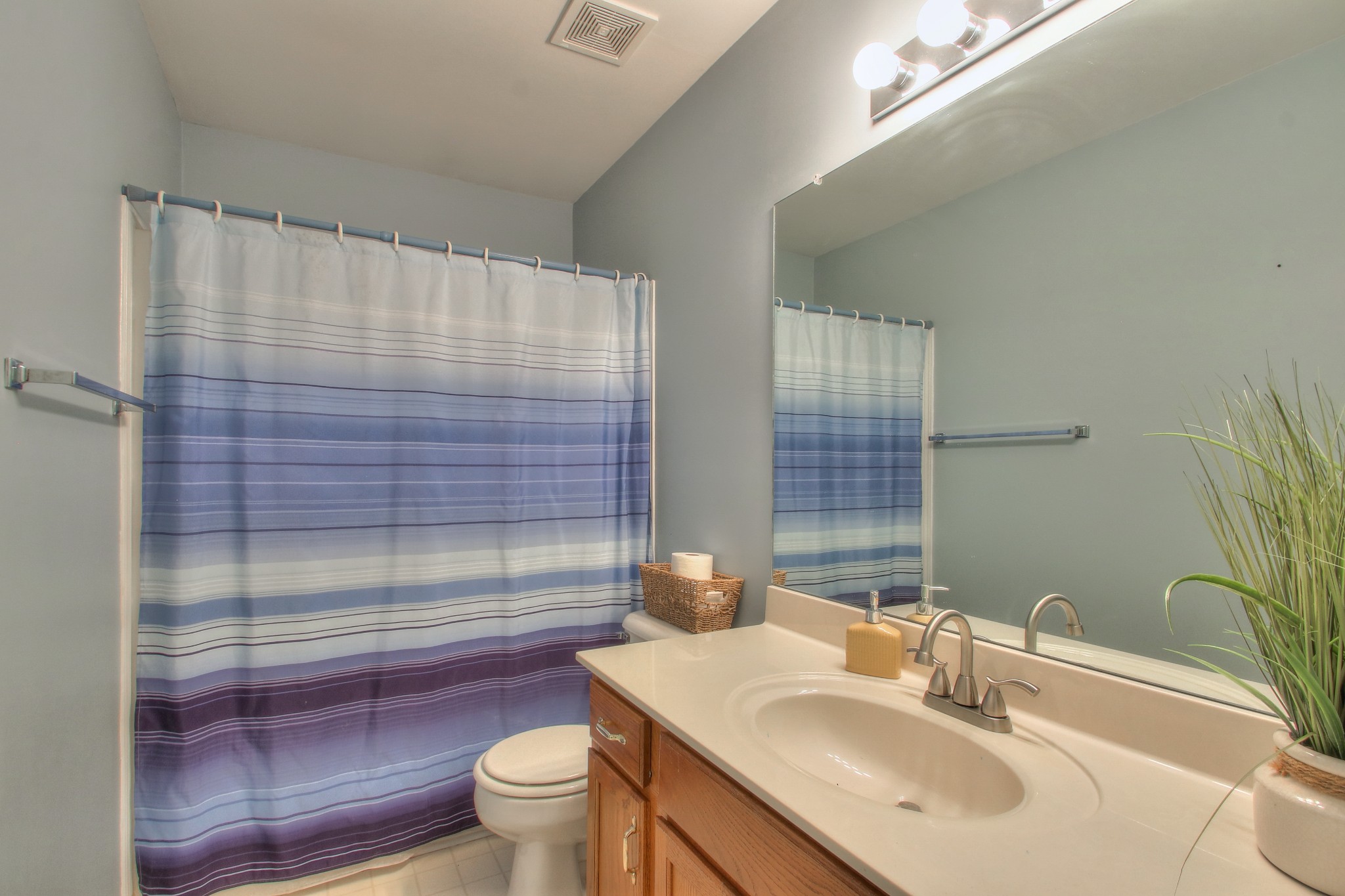 1006 Richland Trail Road Ashland City, TN 37015 - Photo 12 of 33 a bathroom with a sink toilet and shower