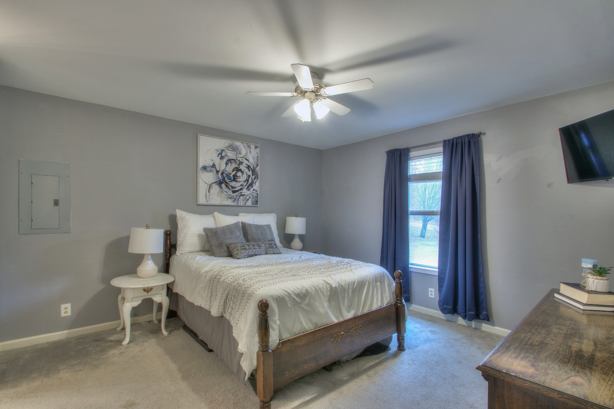 1006 Richland Trail Road Ashland City, TN 37015 - Photo 18 of 33 a bedroom with a bed and a chandelier