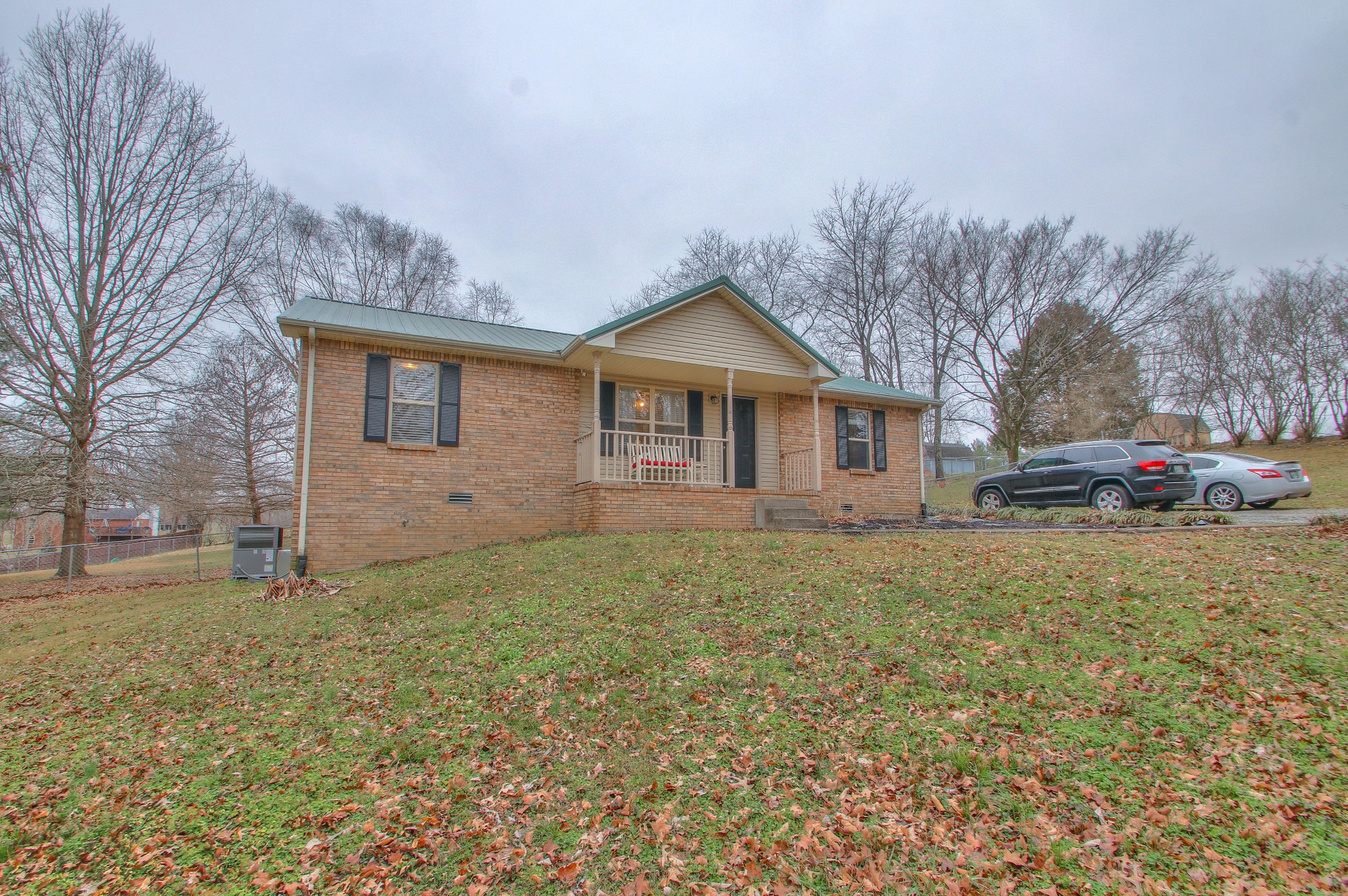 1006 Richland Trail Road Ashland City, TN 37015 - Photo 21 of 33 a view of a yard in front of a house with large trees