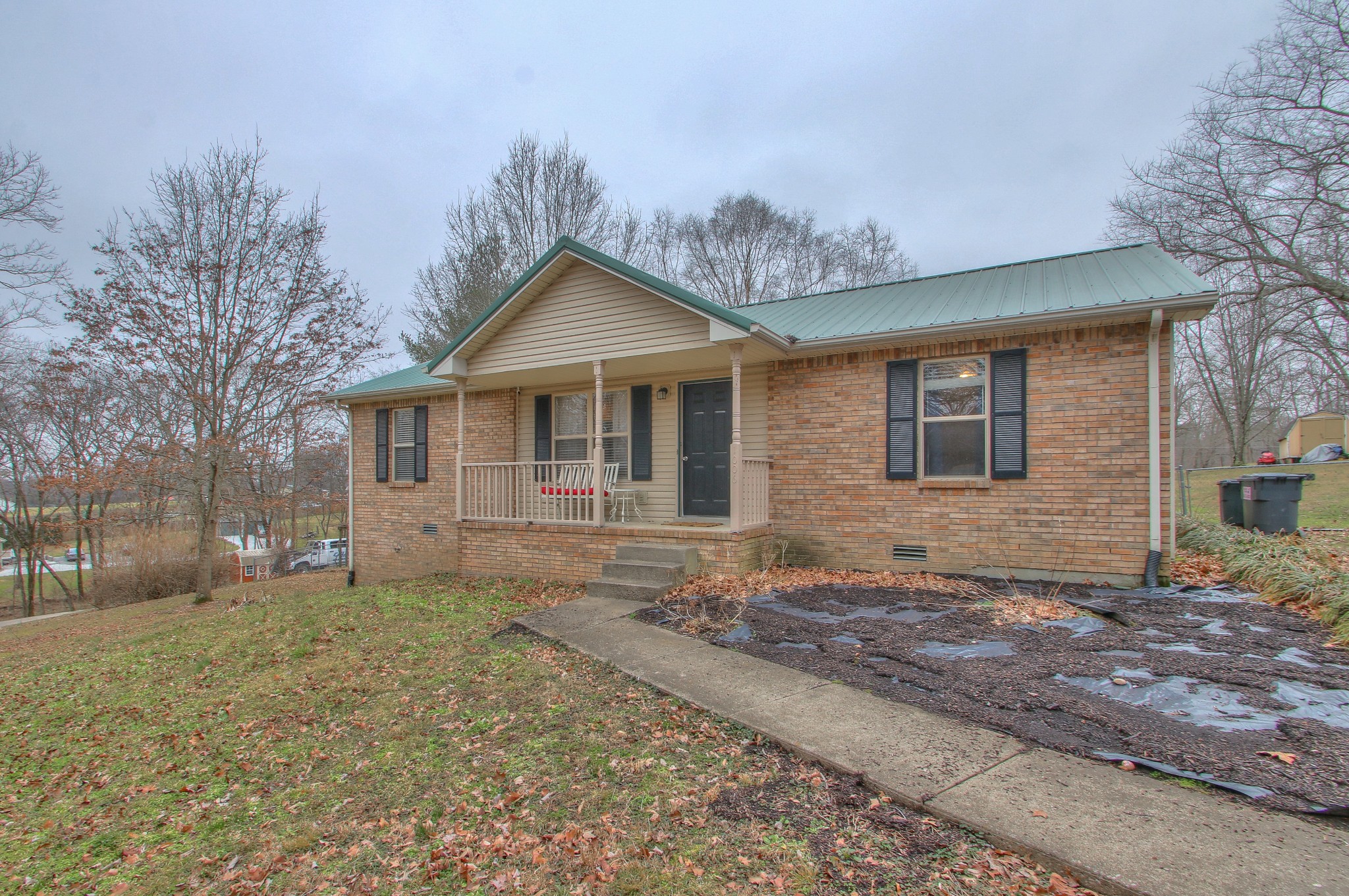 1006 Richland Trail Road Ashland City, TN 37015 - Photo 22 of 33 a view of a house with a yard