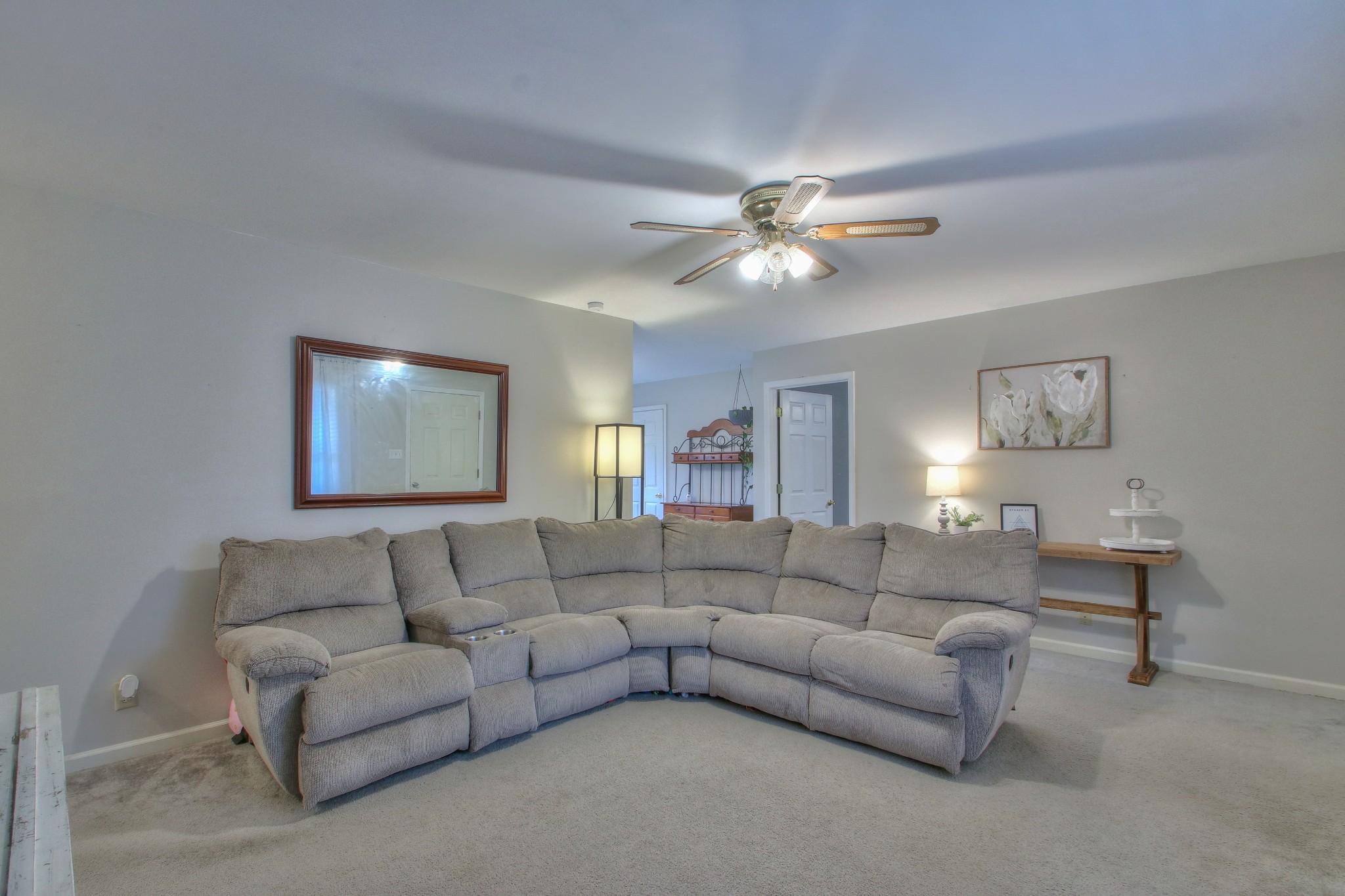 1006 Richland Trail Road Ashland City, TN 37015 - Photo 3 of 33 a living room with furniture and a ceiling fan
