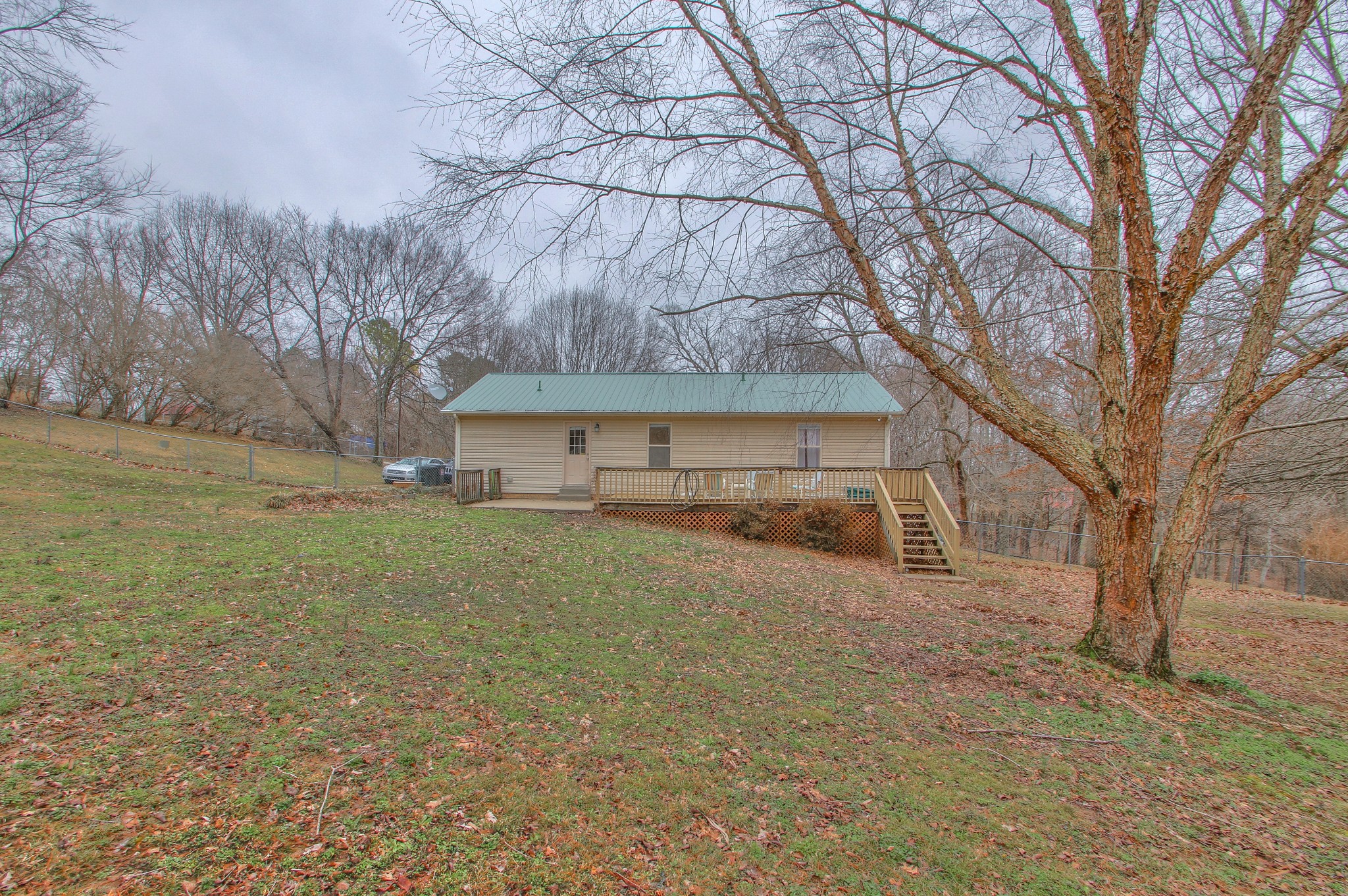 1006 Richland Trail Road Ashland City, TN 37015 - Photo 32 of 33 a view of a house with a large tree in front of it