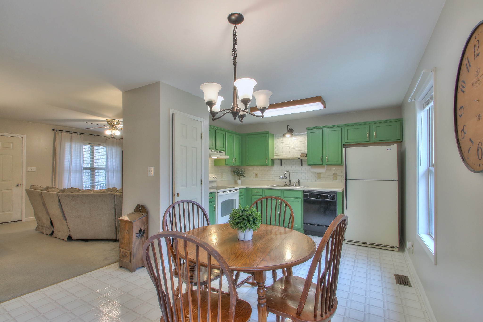 1006 Richland Trail Road Ashland City, TN 37015 - Photo 7 of 33 a dining room with furniture a chandelier and wooden floor
