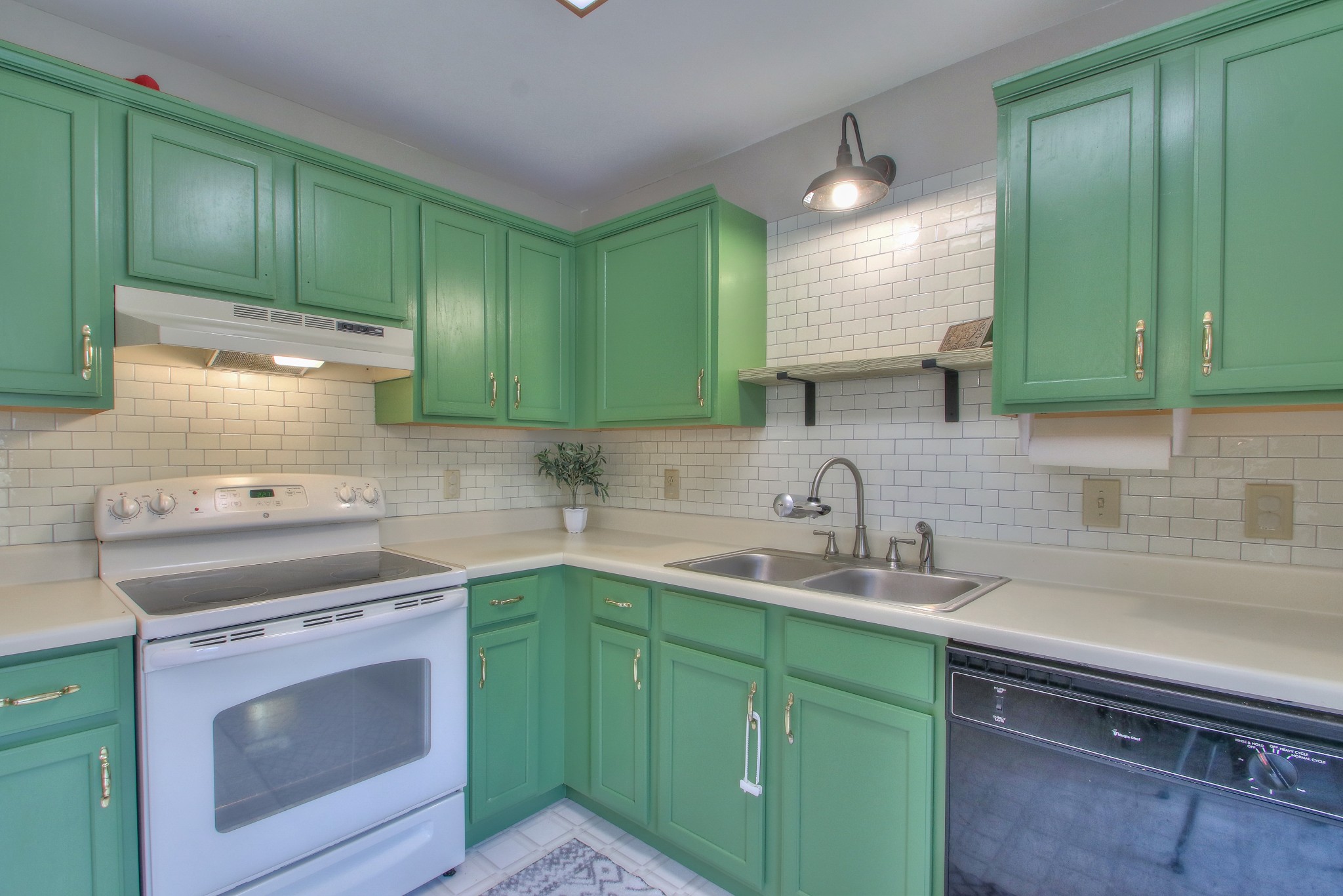 1006 Richland Trail Road Ashland City, TN 37015 - Photo 10 of 33 a kitchen with sink a stove and cabinets