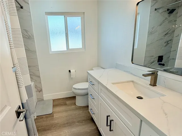 a bathroom with a sink and a toilet