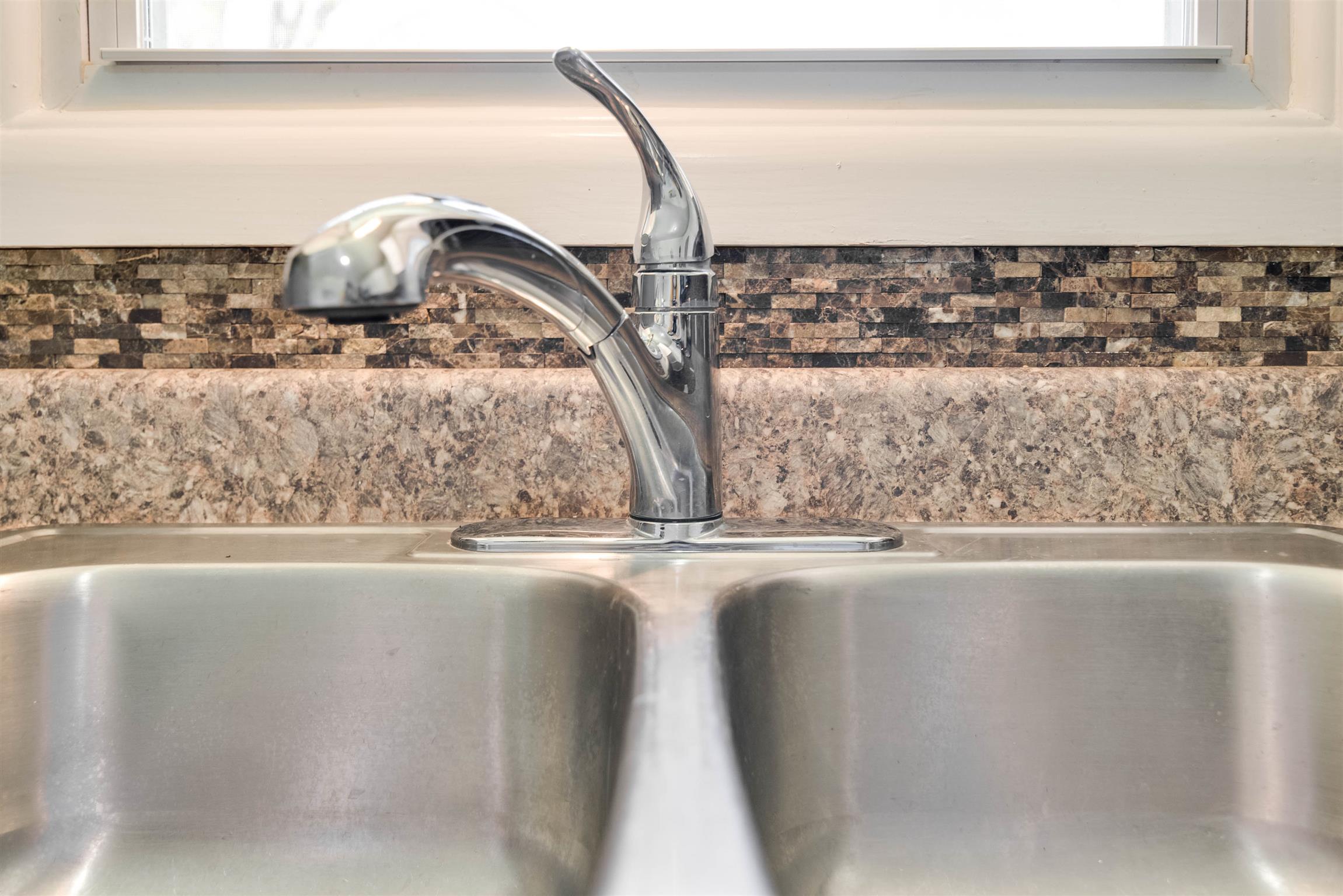 433 Cedarcliff Road Antioch, TN 37013 - Photo 12 of 30 Beautiful backsplash compliments the countertop.